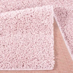 Hoogpolig Vloerkleed - Trim (roze) -Tapijt Winkel csha 500 pink ruecken.jpg