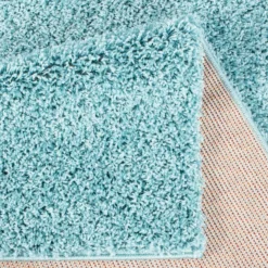 Hoogpolig Vloerkleed - Trim (turkoois) 14 Hoogpolig Vloerkleed - Trim (turkoois) -Tapijt Winkel csha 500 turkis ruecken.jpg