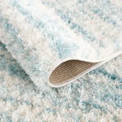 Hoogpolig Vloerkleed - Orellana (blauw) -Tapijt Winkel pulpy 524 blue makro.jpg